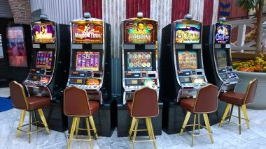 Mobile phone displaying kakap slot account dashboard with payment methods and game history